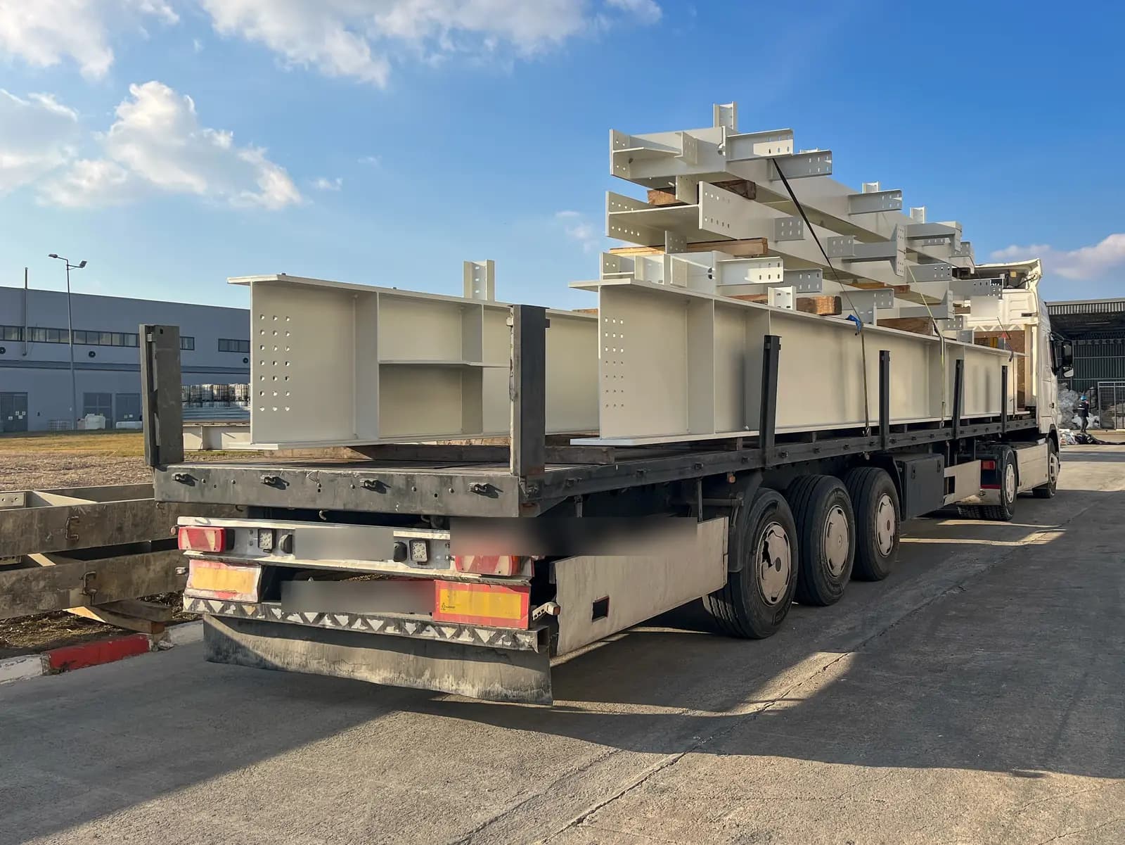 Fabricated steel loaded on a flatbed trailer