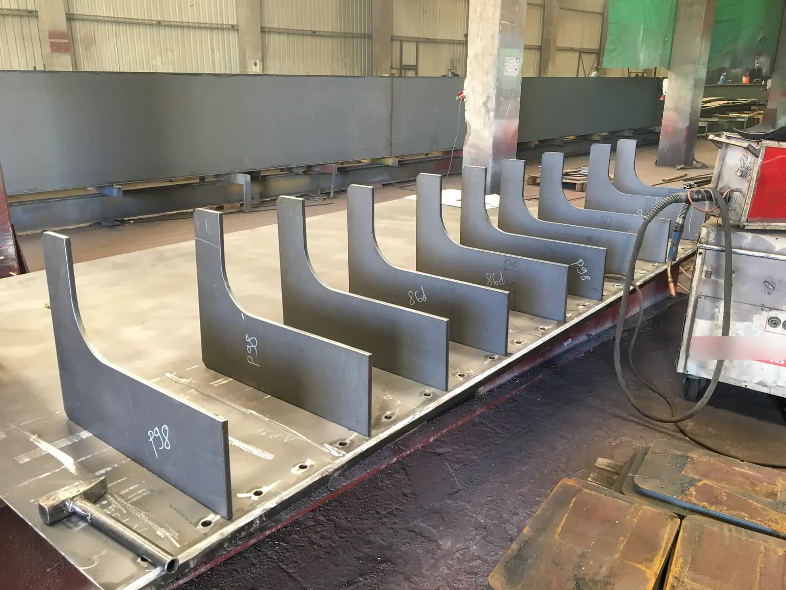 Stiffener plates welded to a steel girder